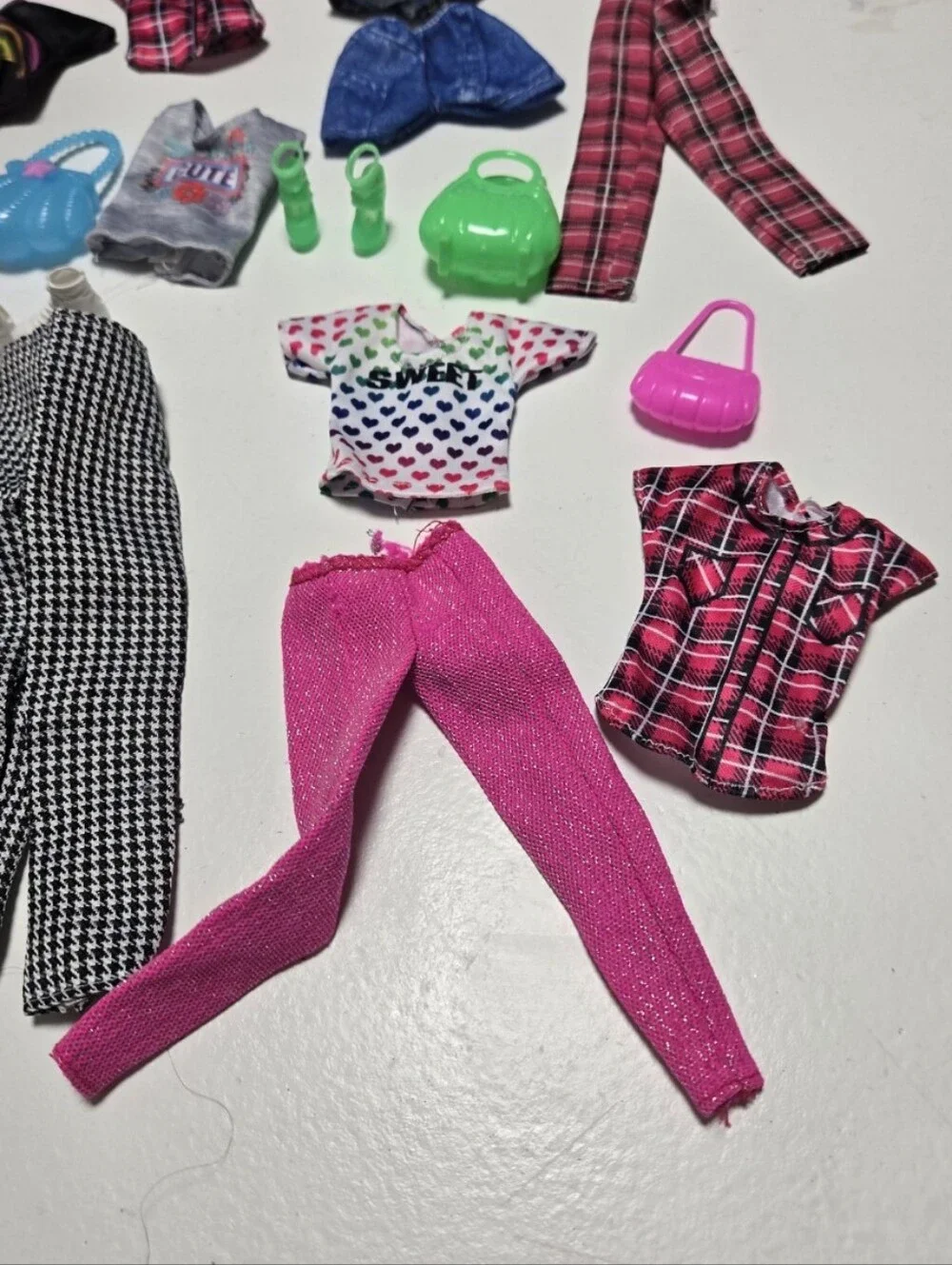Lot Of Barbie Clothes 4 pants 3 shorts 9 shirts 2 pairs shoes 5 purses